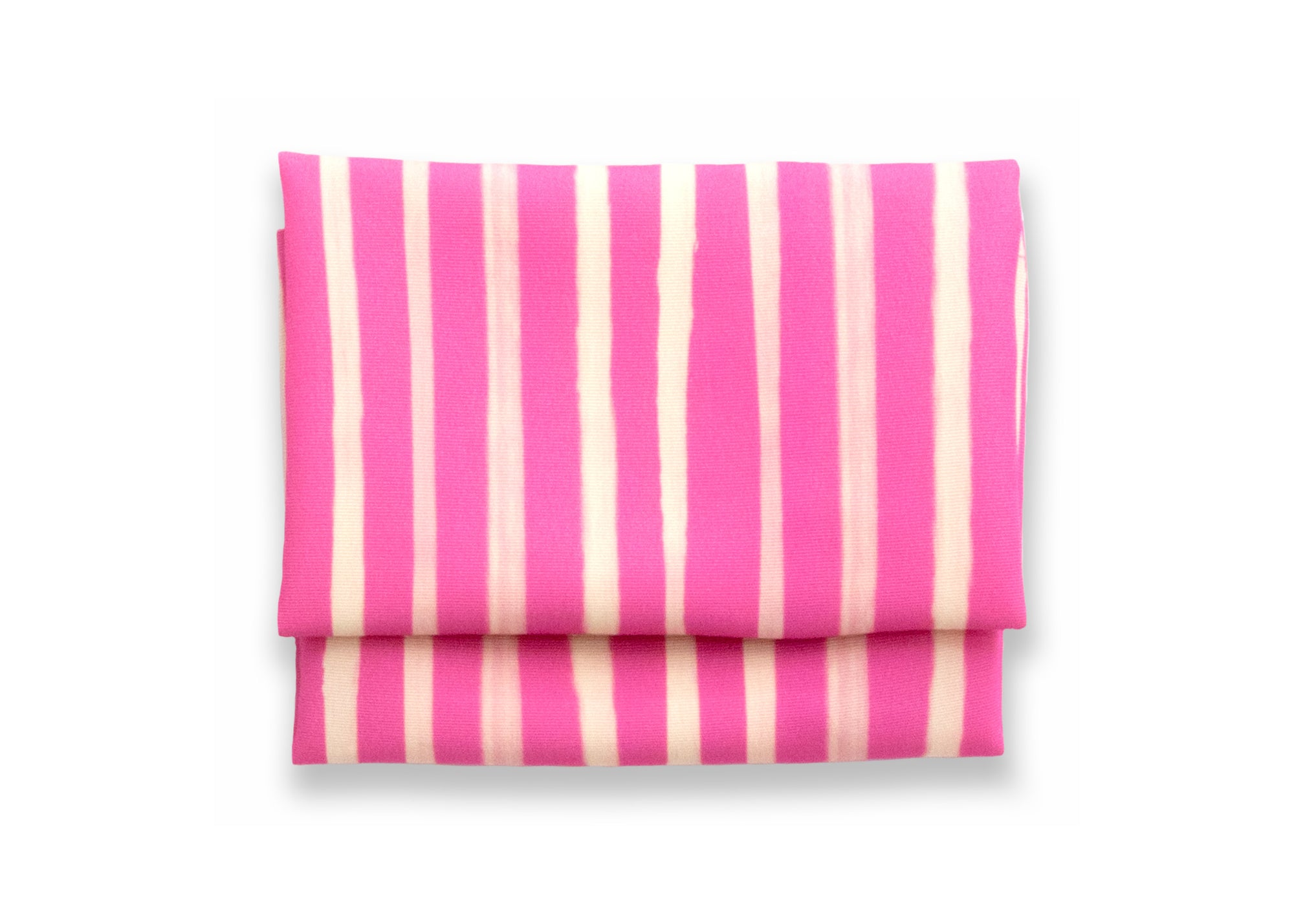 Bright cloth napkin with a pattern of painterly stripes, with quarter-inch hem. Base color is bright magenta, with alternating stripe of cream. The back is the solid base color with small, discreet dark grey logo on bottom left-hand side.  View: 1 napkin folded into a rectangular shape for a table setting, pattern side exposed.