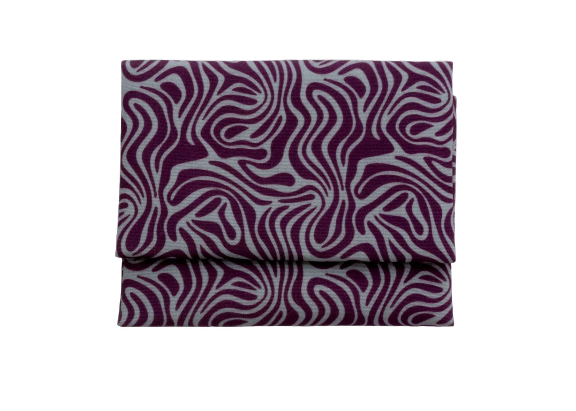 Bright patterned cloth napkin with quarter-inch hem. Base color is stone grey with amorphous layers of dark purple. The back is the base color with small, discreet dark grey logo on bottom left-hand side. View: 1 napkin folded into a rectangular shape for a table setting, with pattern side exposed.